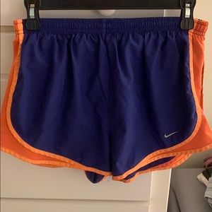 Nike blue and orange running shorts
